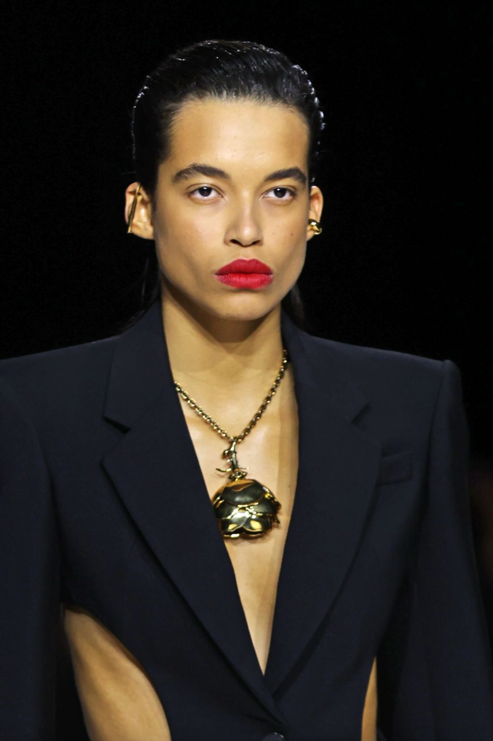 a person with a necklace a person with a necklace