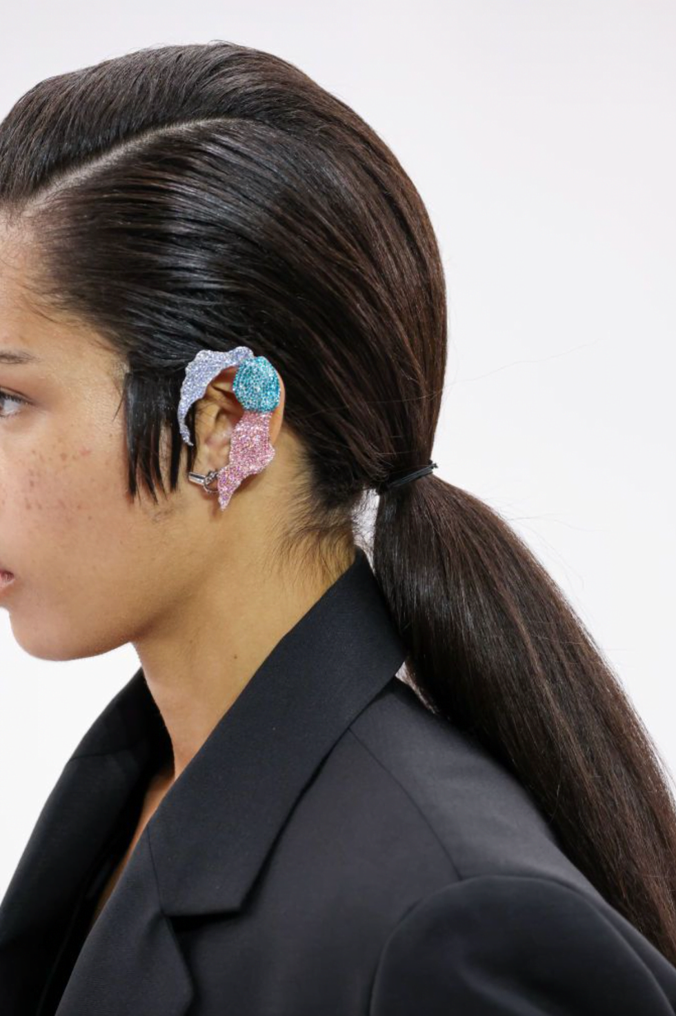 a person with a butterfly on the ear a person with a butterfly on the ear