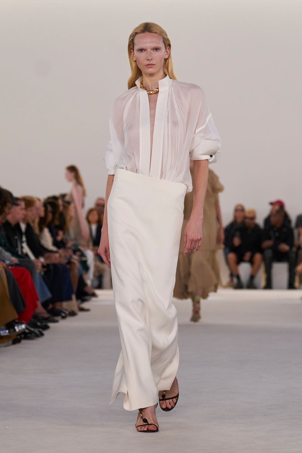 a woman wearing a white dress a woman wearing a white dress